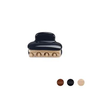 Elegant navy blue and gold acetate hair claw clip for women in minimalist style