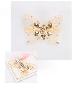 Detail of acetate butterfly hair clip with sparkling champagne crystals and measurements