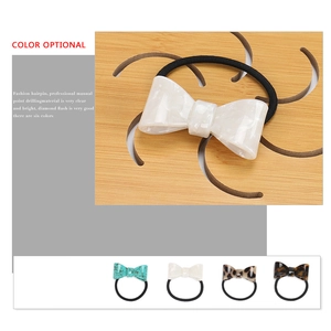 Elegant acetate bow hair ties in assorted tortoiseshell patterns and marble finishes