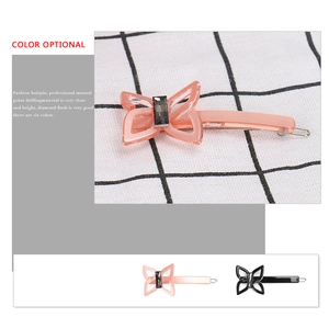 Pink and black butterfly acetate hair clips with crystal accent for elegant hairstyles