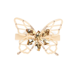 Elegant beige butterfly hair clip with amber rhinestones on a clean white background