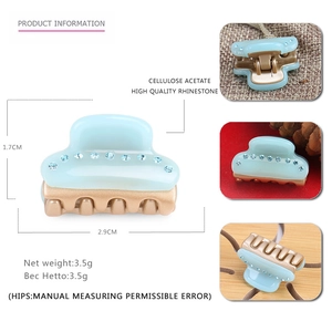Blue cellulose acetate hair claw clip with rhinestones measuring 2.9cm x 1.7cm