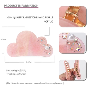 Pink cloud acrylic hair claw with iridescent rhinestones and pearl detail