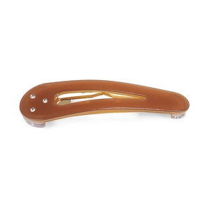 Close-up of translucent brown teardrop snap clip with three sparkling rhinestones