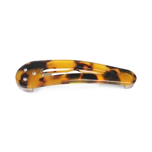 Vintage tortoiseshell acetate hair clip with crystal accents and cutout design