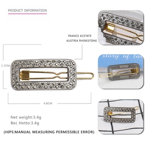 Grey acetate geometric hair clip with Austrian rhinestones measuring 4.8cm by 1.7cm