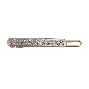 Close-up of a grey acetate hair clip with double-row rhinestones and a gold metal base