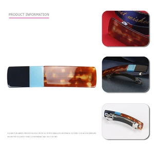 Classic acetate spring hair clip with patchwork tortoiseshell and blue geometric blocks