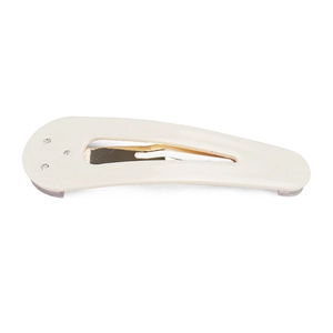 Detail of cream acetate teardrop hair clip with three sparkling rhinestones on side