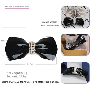Classic black acetate hair clip with pearl rhinestone bow and spring metal fastener