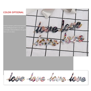 Fashionable LOVE letter hair clips in marbled acetate featuring multiple color options
