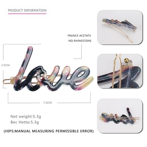 Colorful marble acetate LOVE hair clip for women with dimensions 7.6cm by 3.9cm