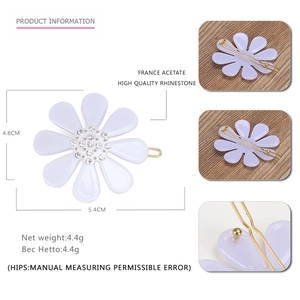 Detail view of daisy flower hair clip in lavender acetate with rhinestones and dimensions
