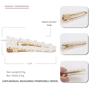 Elegant pearl hair clip with gold metal base and acetate board 6.1cm x 2.2cm dimensions