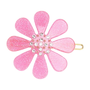 Detailed macro view of pink acetate flower hair clip with silver glitter and central rhinestones