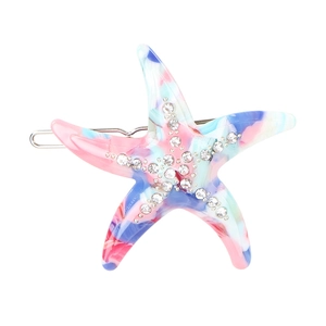 Close-up of marble pattern acetate starfish hair clip with sparkling rhinestones detail