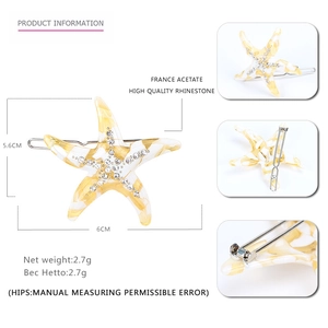 Starfish shaped acetate hair claw with rhinestones in marble white finish, 6cm size