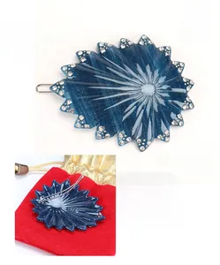 Barrette étoile de mer en acétate bleu avec strass et pince à ressort en métal