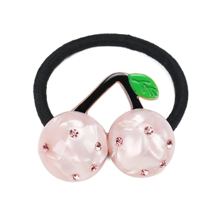 Pink cherry hair tie with crystal rhinestones and green leaves on black elastic band