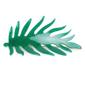 Close-up of green acetate leaf hair clip with gold metal base and glitter finish