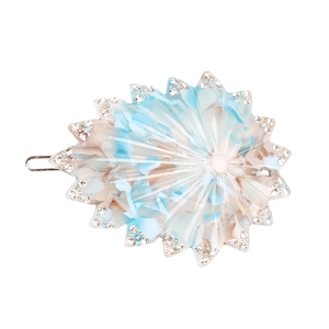 Barrette étoile de mer en acétate marbré bleu avec strass brillants et pince crocodile