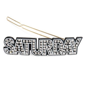 Détail de la barrette Saturday avec strass scintillants et base en métal doré