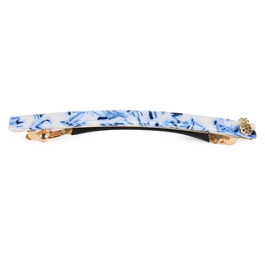 Detail of blue and white marble acetate hair clip with golden pineapple charm
