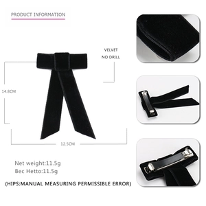 Detailed specs of black velvet bow hair clip with spring fastener and 14.8cm length
