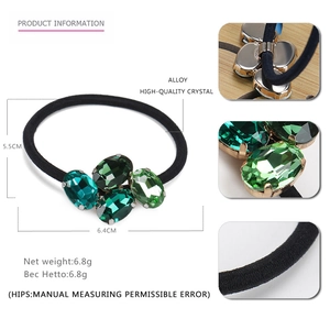 Elegant elastic hair tie featuring green oval crystal rhinestones with alloy base