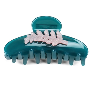 Classic teal resin hair claw clip with pink coral embossed pattern for women styling