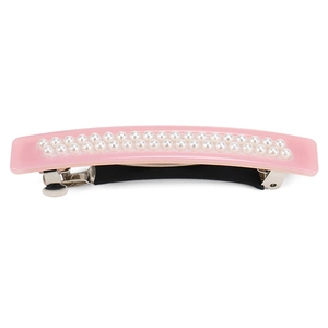 Detail of pink acetate hair clip with double-row white pearls and silver spring clip