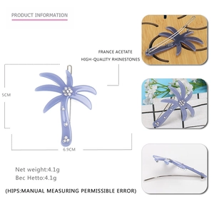 Detailed views of purple coconut tree hair clip with acetate finish and white rhinestones