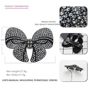 Sparkling crystal rhinestone bow hair clip with black acetate finish and silver spring fastener