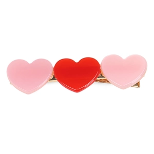 Cute Korean heart hair clip with pink and red acetate hearts on golden metal base