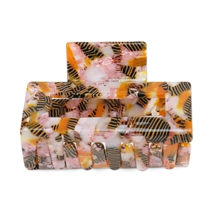 Minimalist large geometric acetate hair claw with orange and white zebra pattern