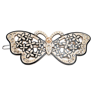 Acetate butterfly hair clip with sparkling rhinestones and pearl center embellishment