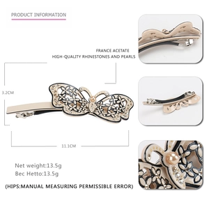 France acetate bow butterfly hair clip with rhinestones and pearl on white background