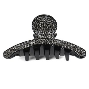 Pince à cheveux étincelante avec strass noirs et gris pour une coiffure élégante