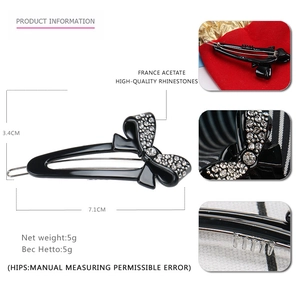 Elegant black acetate bow hair clip with white rhinestones and anti-slip metal grip