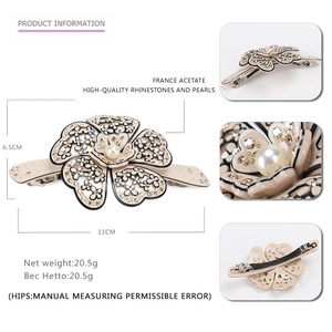 Elegant camellia acetate hair clip with pearls and champagne rhinestones for women