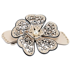 Elegant camellia acetate hair clip with crystal embellishments and pearl center