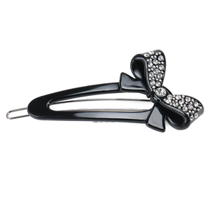 Close-up of black acetate bow hair clip with sparkling rhinestones and silver BB metal base