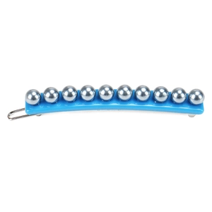Detail view of blue hair clip with grey pearls and metal spring closure mechanism