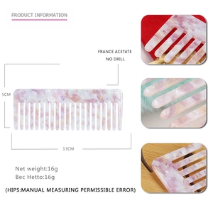 Macro detail and size dimensions of lavender marble acetate wide tooth hair comb