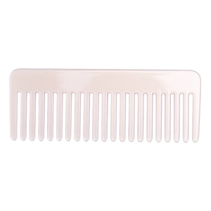Macro detail of wide-tooth pale pink acetate hair comb for detangling hair