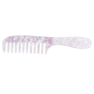 Detail of pink and white marble acetate wide-tooth hair comb with hanging hole design