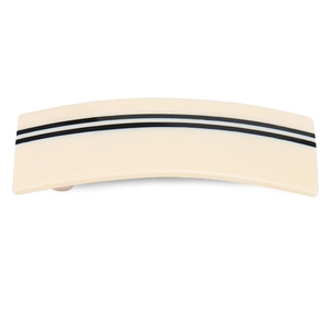 Détail de la barrette rectangulaire crème avec deux rayures noires et fini brillant