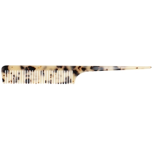 Macro shot of tail comb with vintage tortoise pattern for professional hair styling