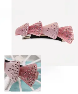 Macro shot of pink acetate hair clip with rhinestones, sized 8.8x3.5cm for women