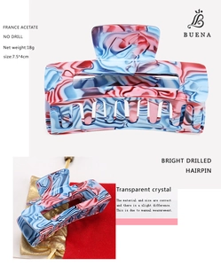 Detail view of acetate hair claw with red-blue marble pattern and size specifications